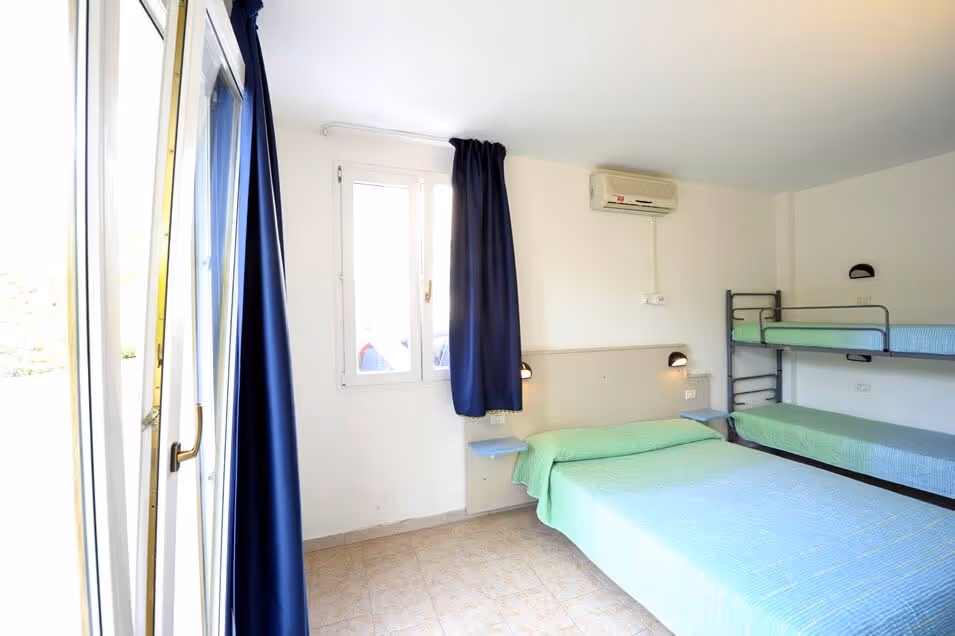 Slaapkamer in een verblijf van Camping Bella Italia