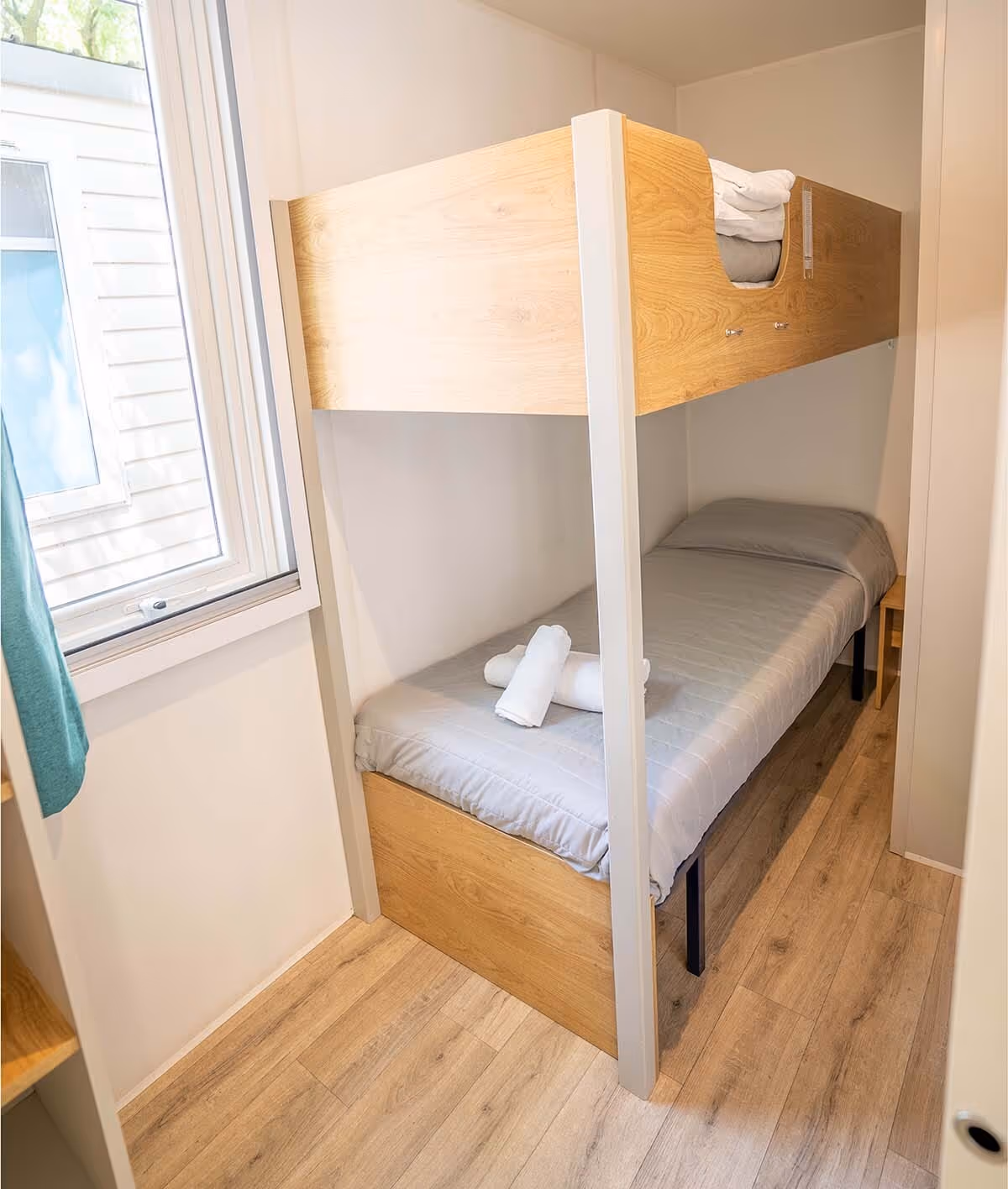 Kinderkamer met stapelbed in een stacaravan op Camping Bella Italia