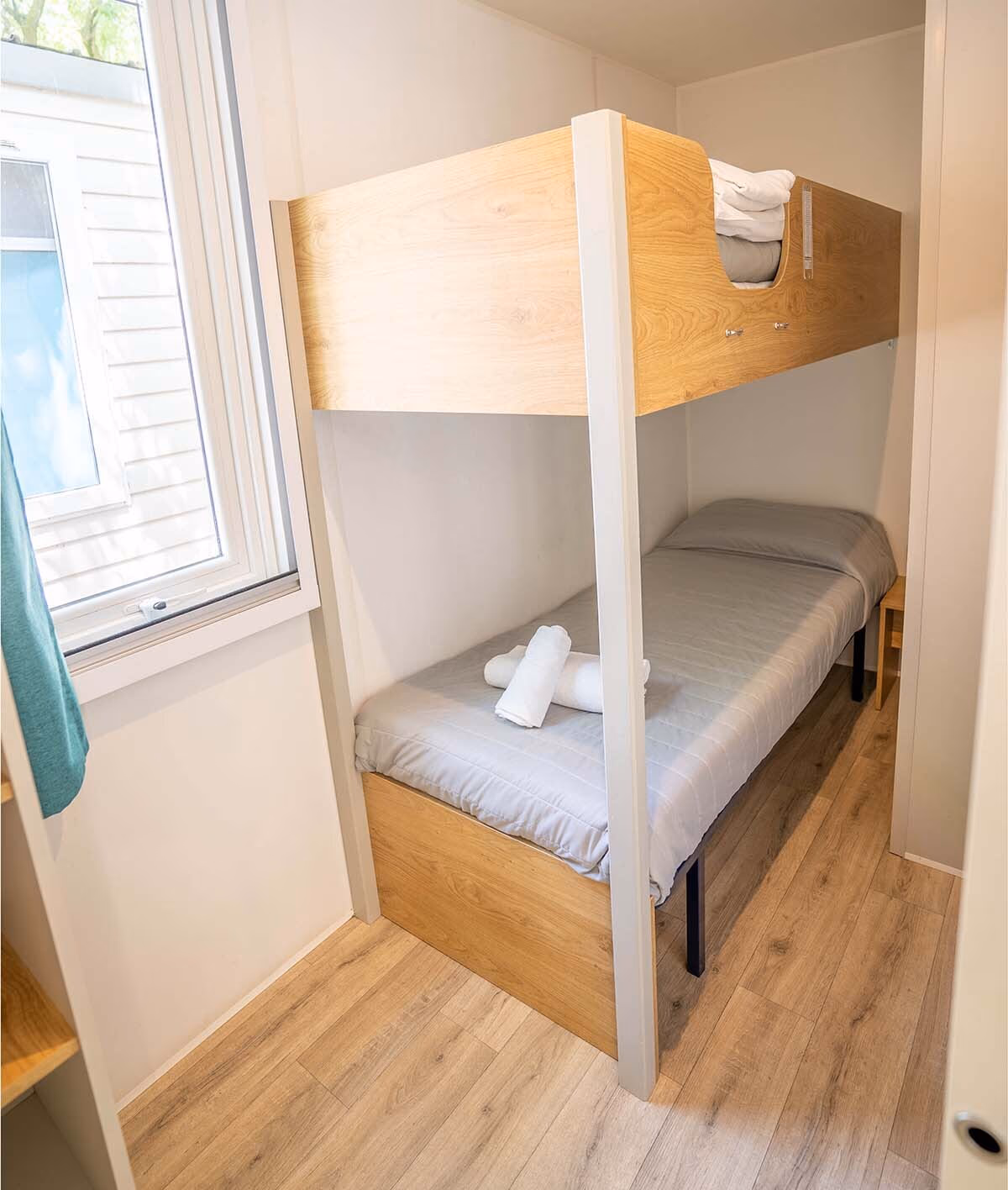Kinderkamer met stapelbed in een stacaravan op Camping Bella Italia
